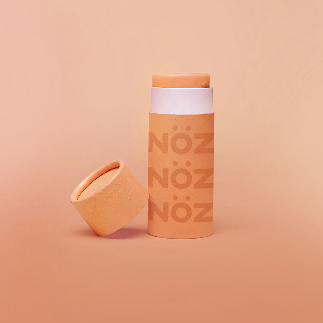 NӦZ sunscreen for the nose in the colorful shade orange