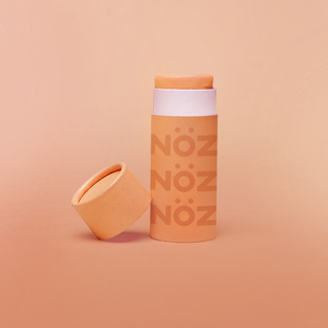 NӦZ sunscreen for the nose in the colorful shade orange